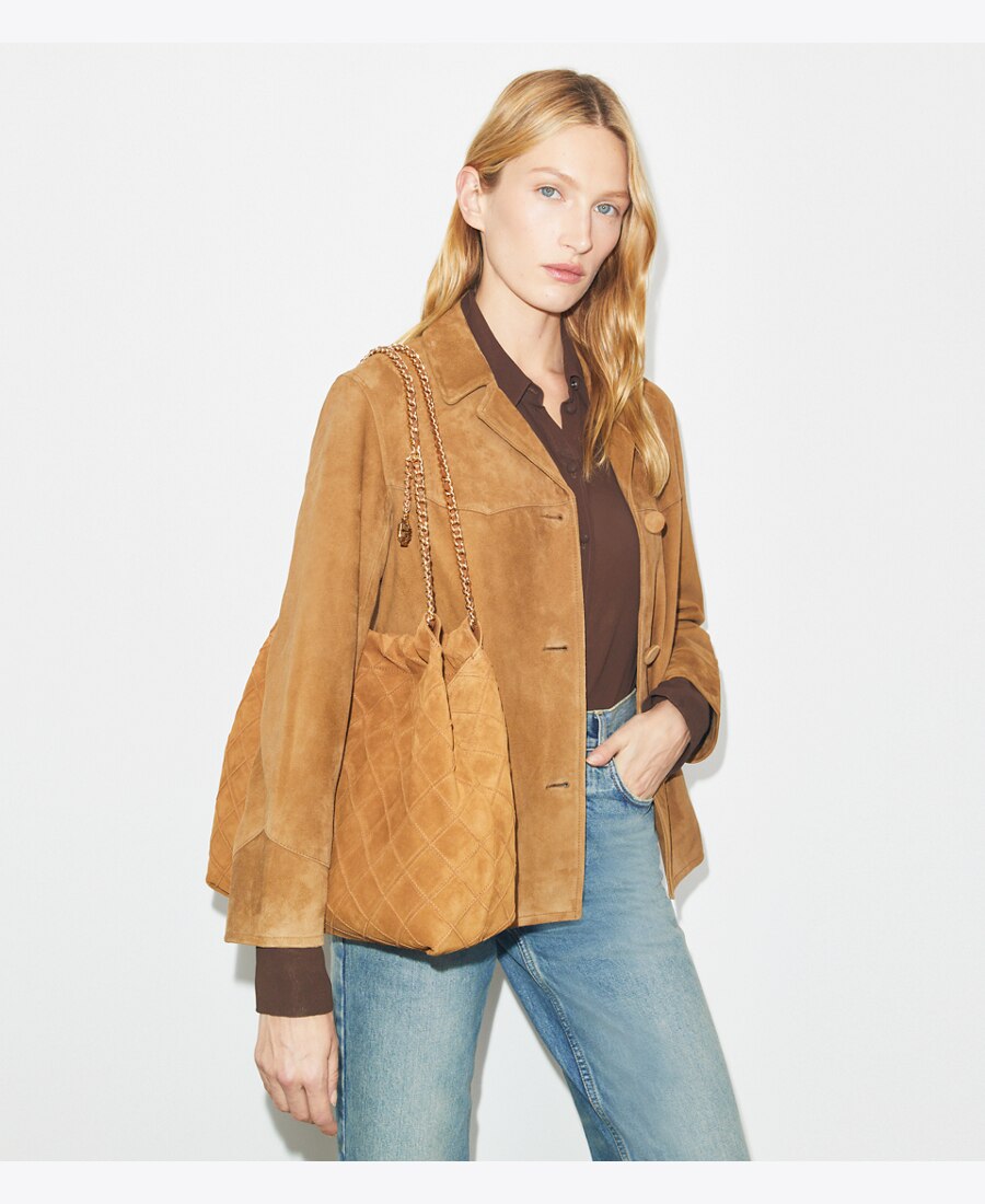 Tory Burch Fleming Soft Suede Hobo Bag styled on a model